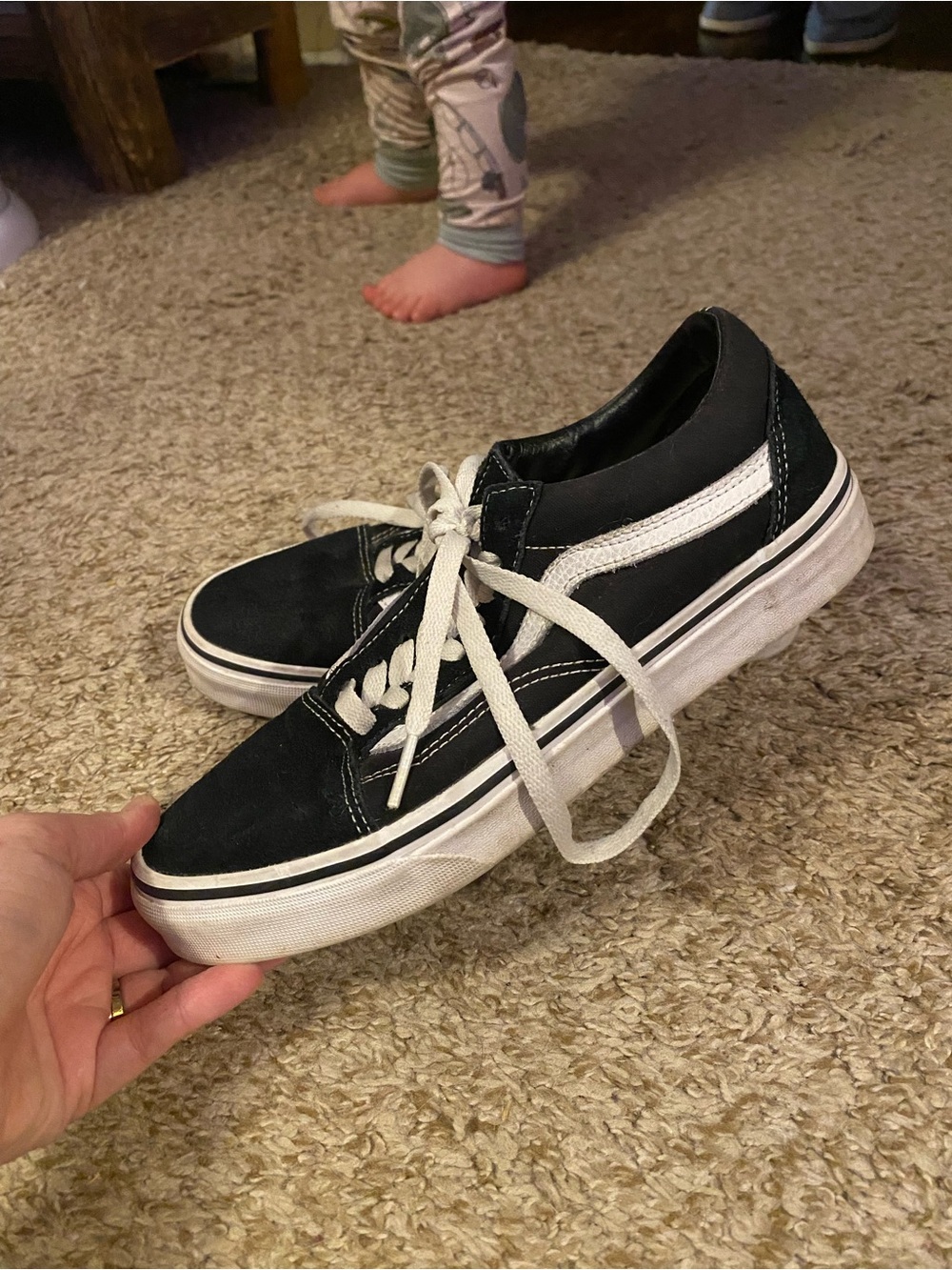 Vans women’s Black and White Classic Low-Top Sneakers